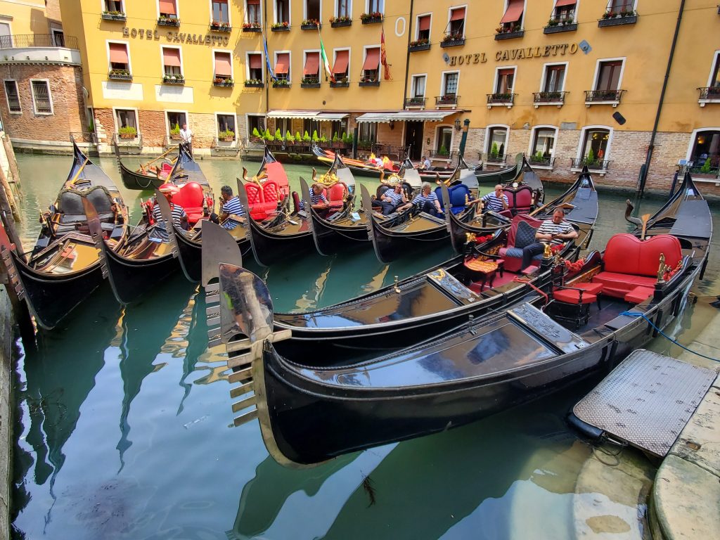 Gondoliers Venice Italy